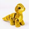 mini dinosaurus zlatý